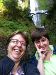 Selfie in front of waterfall.